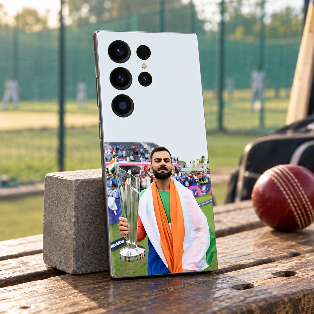 Virat Kohli Trophy Tricolour Mobile Skin - Practice bench Virat Kohli trophy mobile skin standing on a wooden bench near green cricket nets