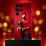 Virat Kohli smiling with a gold trophy against red on a mobile skin, red and gold studio hero