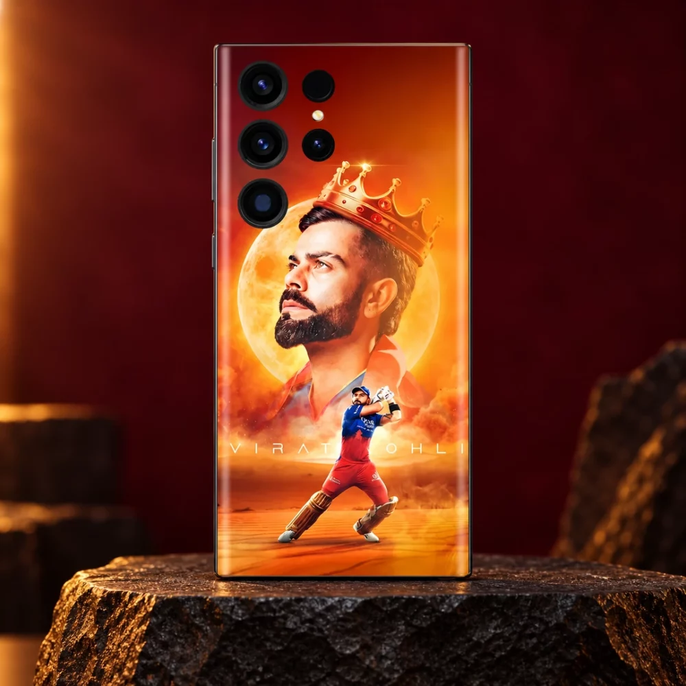 Orange Virat Kohli mobile skin with golden crown, moon portrait and batting pose, burgundy studio hero