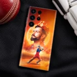Orange Virat Kohli mobile skin with golden crown, moon portrait and batting pose, cricket-kit flat lay