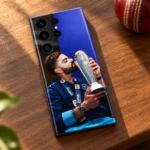 Virat Kohli kissing a silver trophy photo mobile skin, walnut desk lifestyle