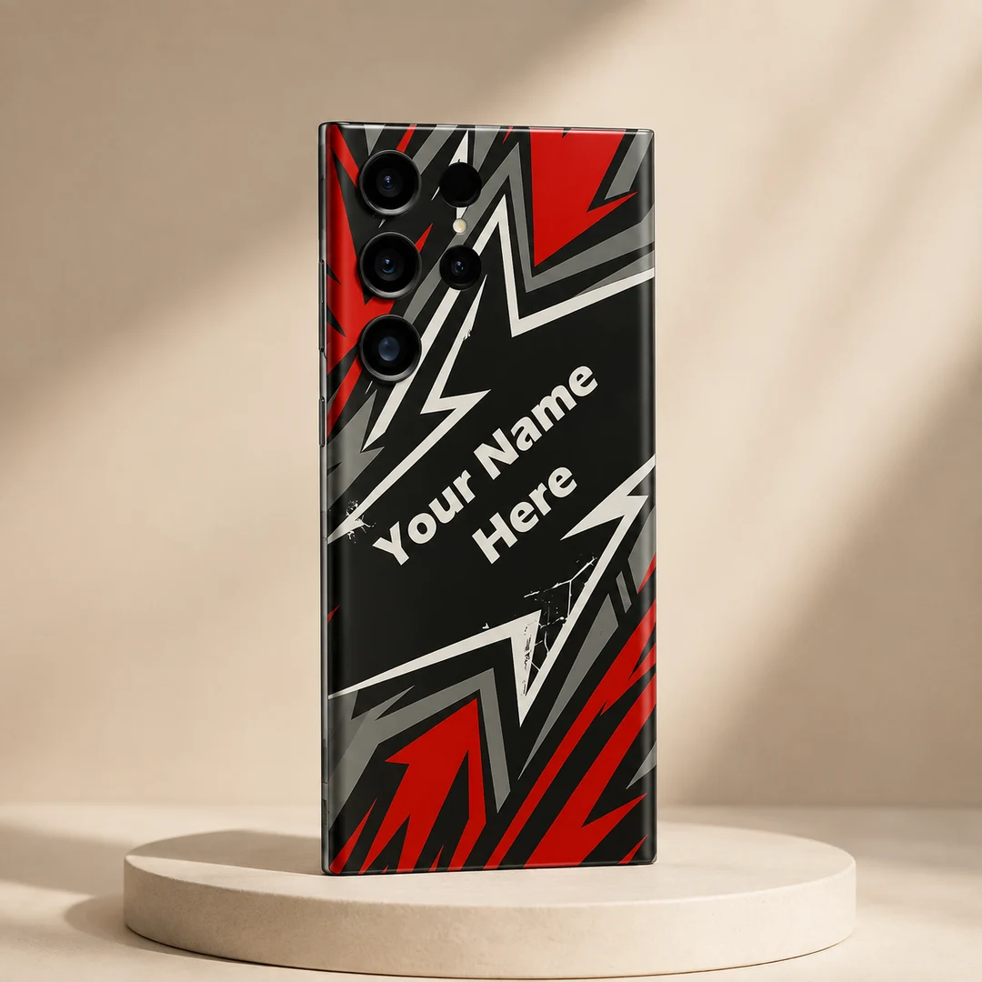 Custom Name Gaming Mobile Skin - angled view Custom Name Gaming Mobile Skin — angled view showing red, black, grey and white angular gaming artwork with diagonal sample name