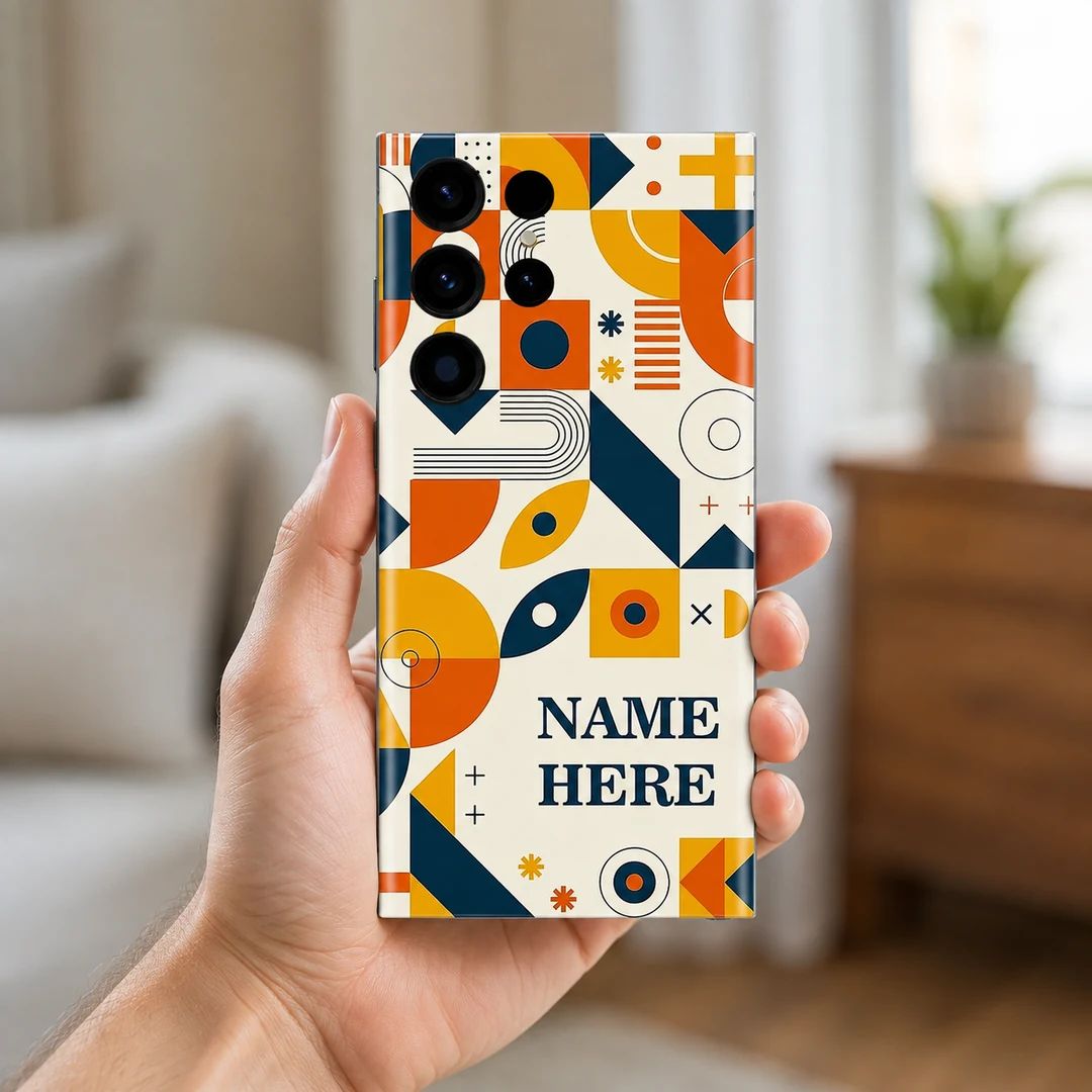 Geometric Pop Art Customized Name Mobile Skin - in hand Geometric Pop Art Customized Name Mobile Skin — in hand showing retro ivory, orange, mustard and navy geometric artwork with sample name