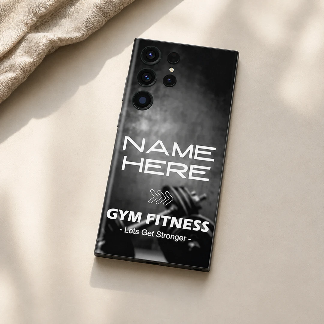 Gym Fitness Customized Name Mobile Skin - flat lay Gym Fitness Customized Name Mobile Skin — flat lay showing black and grey dumbbell artwork with Gym Fitness lettering and sample name