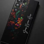 Royal Floral Glow Customized Name Mobile Skin — name detail showing colourful floral scrollwork on black with vertical white cursive sample name