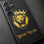 Royal Lion Crown Customized Name Mobile Skin — name detail showing a gold crowned lion on charcoal with ornate gold sample name lettering