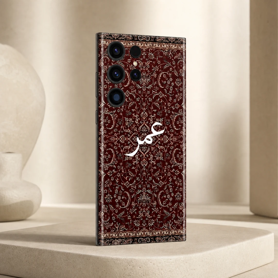 Damask Dunes Custom Name Mobile Skin - angled view Damask Dunes Custom Name Mobile Skin — angled view showing burgundy damask floral artwork and white personalised calligraphy