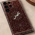 Damask Dunes Custom Name Mobile Skin — name detail showing burgundy damask floral artwork and white personalised calligraphy