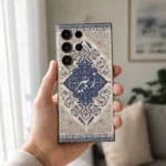 Isfahan Elegance Custom Name Mobile Skin shown in in hand with Persian floral artwork and personalised name