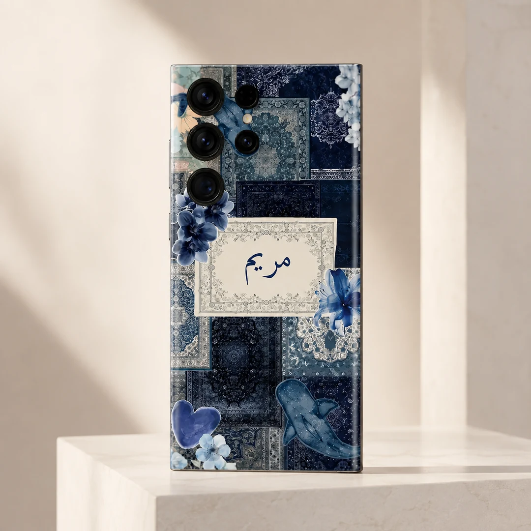 Velvet Persia Custom Name Mobile Skin - angled view Velvet Persia Custom Name Mobile Skin — angled view showing navy Persian patterns, blue flowers and a cream custom name panel