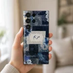 Velvet Persia Custom Name Mobile Skin — in hand showing navy Persian patterns, blue flowers and a cream custom name panel